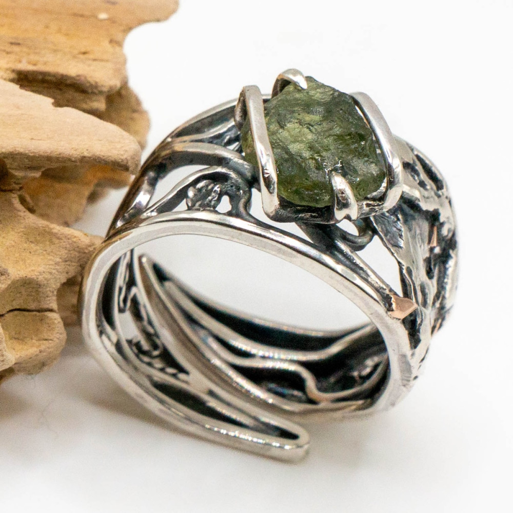 Handcrafted sterling silver ring with moldavite and gold accents