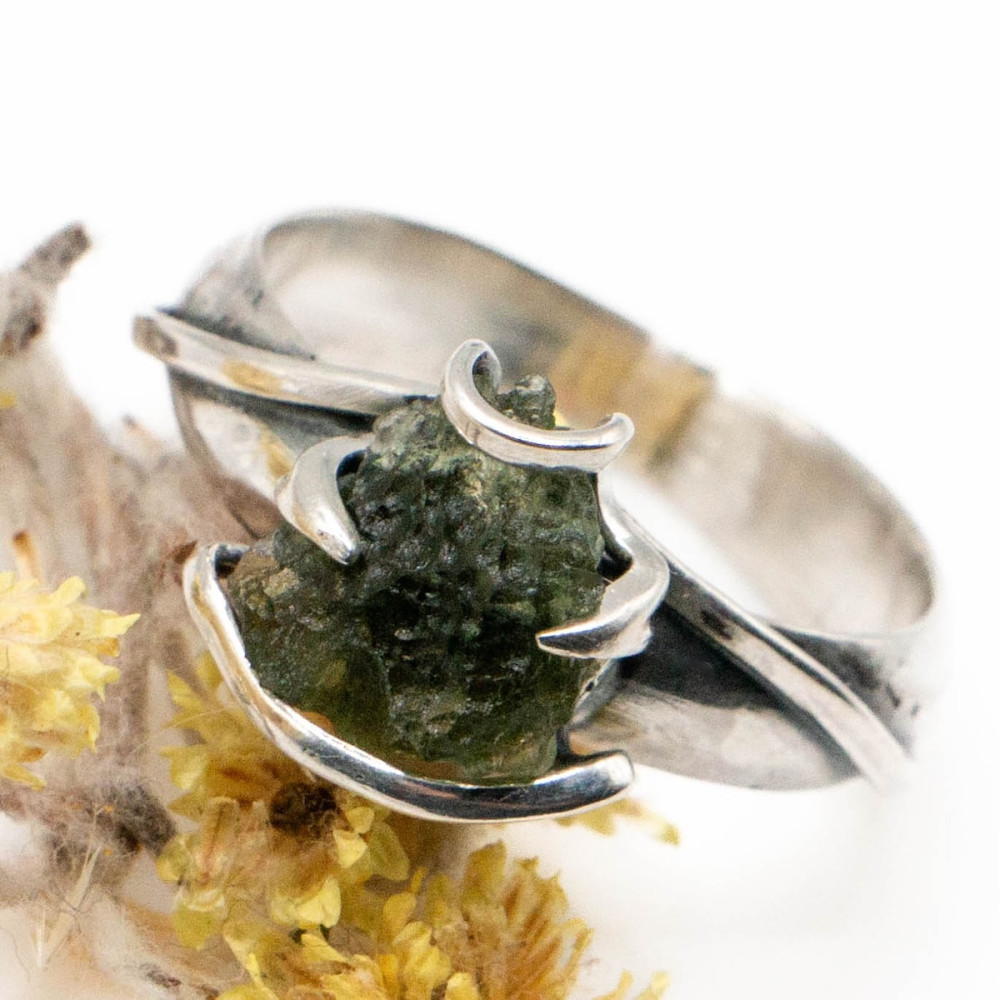 A silver ring with moldavite is like a drop of starlight